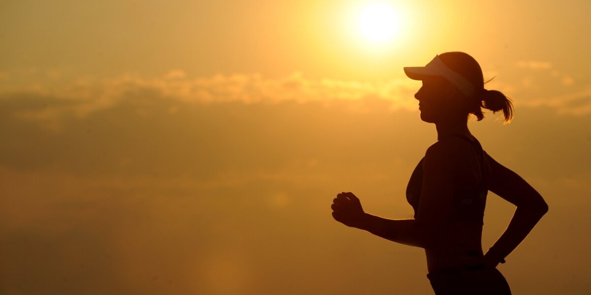 a woman running during her morning workout routine
